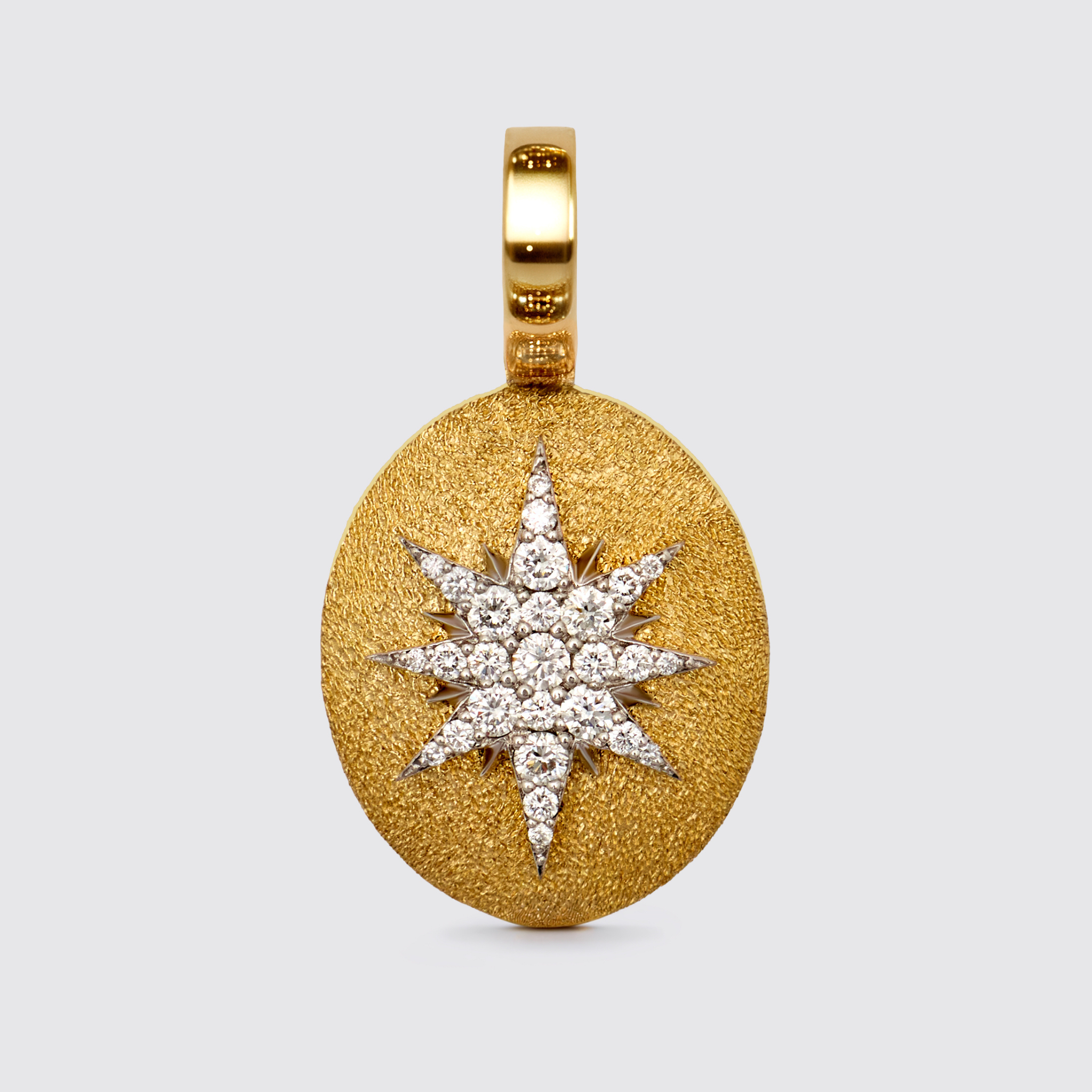 Crush Stella oval pendant in 18k yellow gold with diamond pavé star, luxury fine jewelry