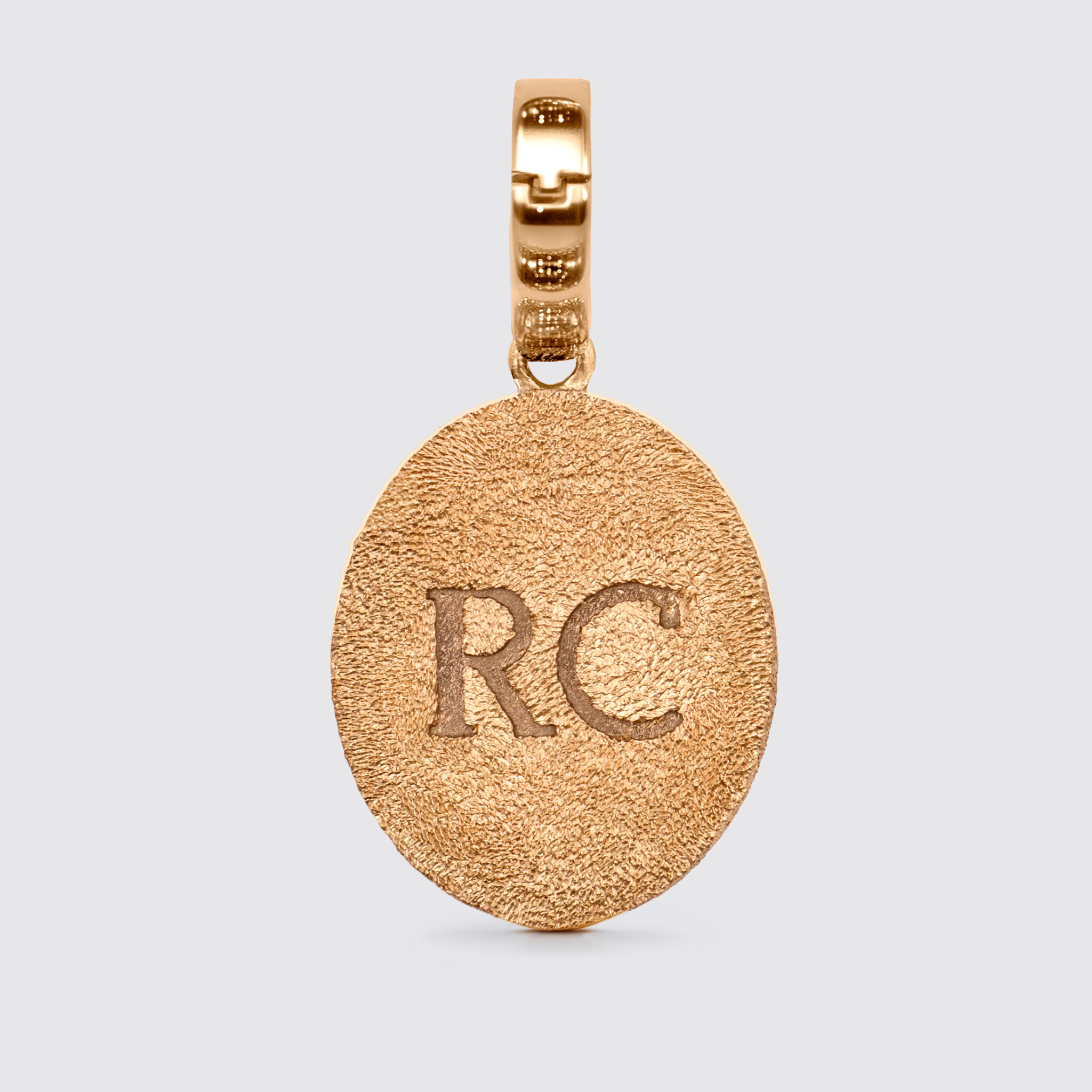Crush Stella oval pendant in 18K rose gold with pink sapphires and stardust texture, luxury fine jewelry